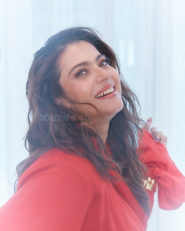 Stunning Kajol in a Red Satin Wrap Dress Photos 02