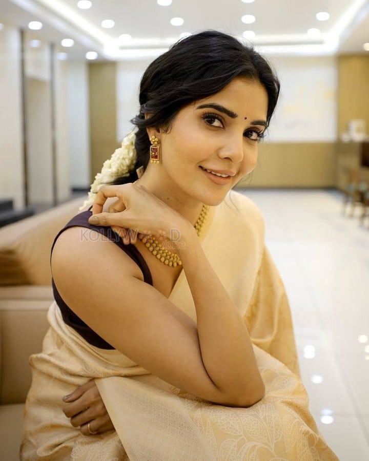 Charming Madhuri Jain in a Beige Silk Saree with a Black Sleeveless Blouse Photos 01
