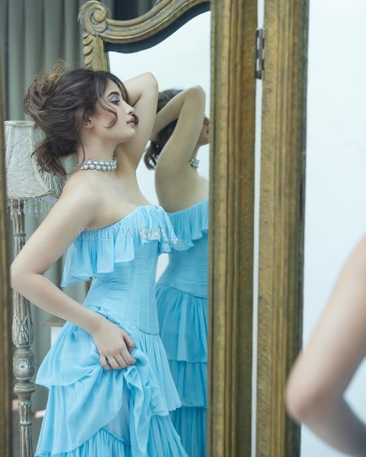 Actress Rasha Thadani in a Blue off Shoulder Corset Style Ruffle Gown Photos 09