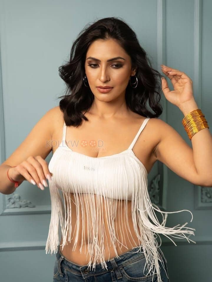 Bold and Hot Shivangi Verma in a White Fringed Crop Top with a Blue Denim Pant Photos 02
