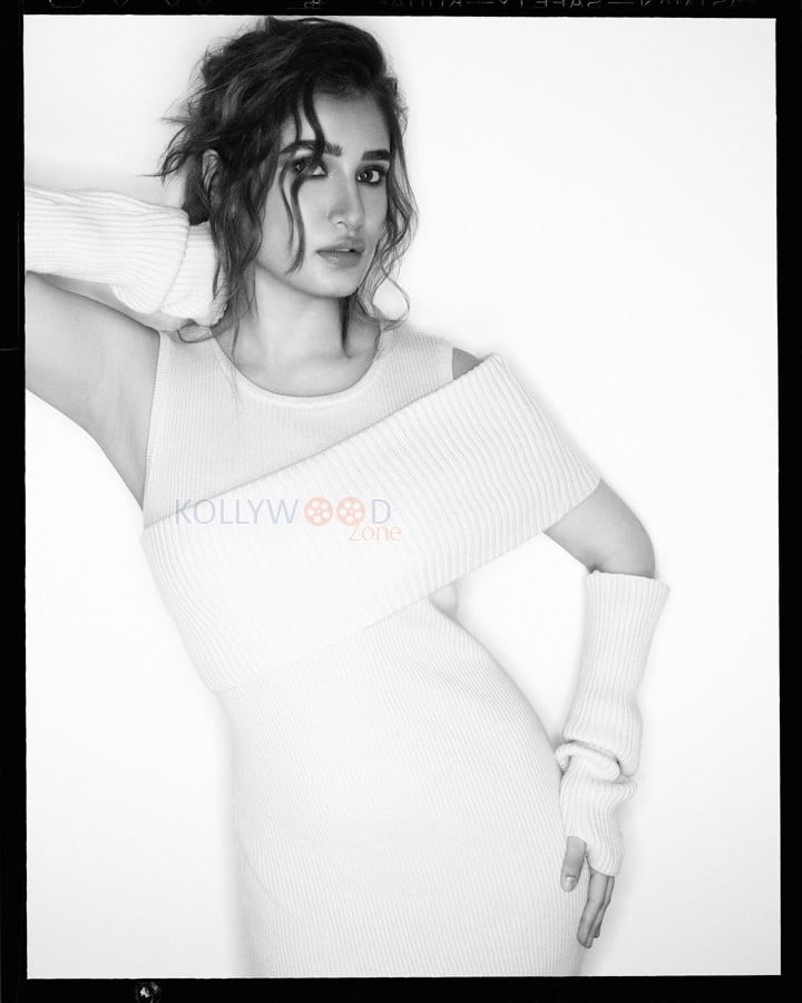 Charming Rasha Thadani in a Cold Shoulder Sweater Dress Photos 03