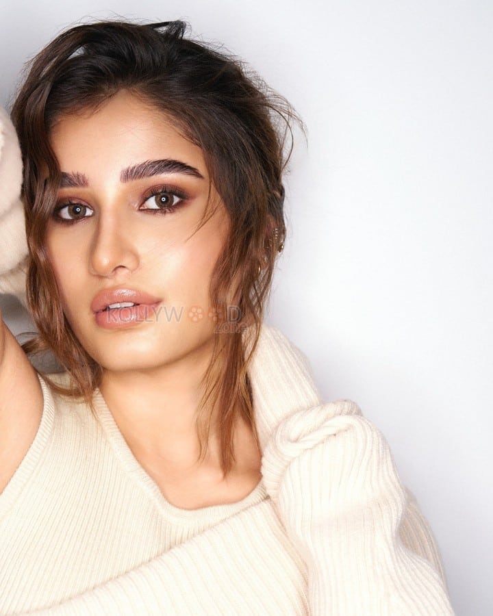 Charming Rasha Thadani in a Cold Shoulder Sweater Dress Photos 04