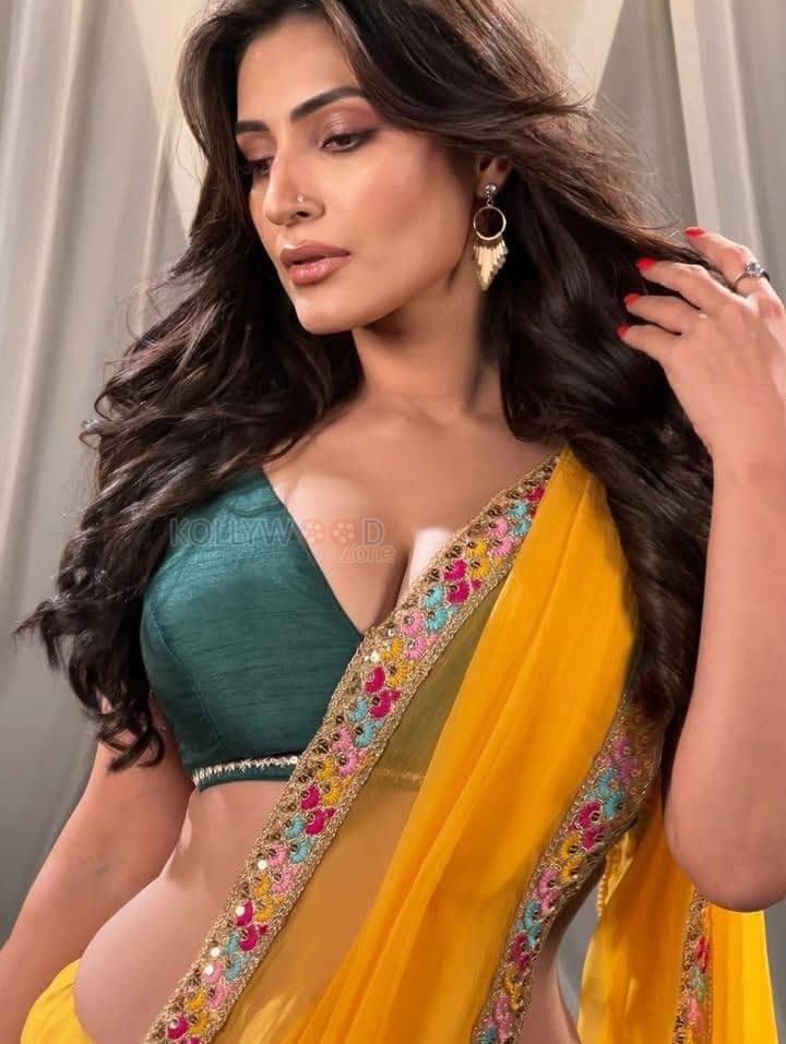 Dazzling Shivangi Verma in a Yellow Saree with a Printed Border and Green Blouse Photos 01