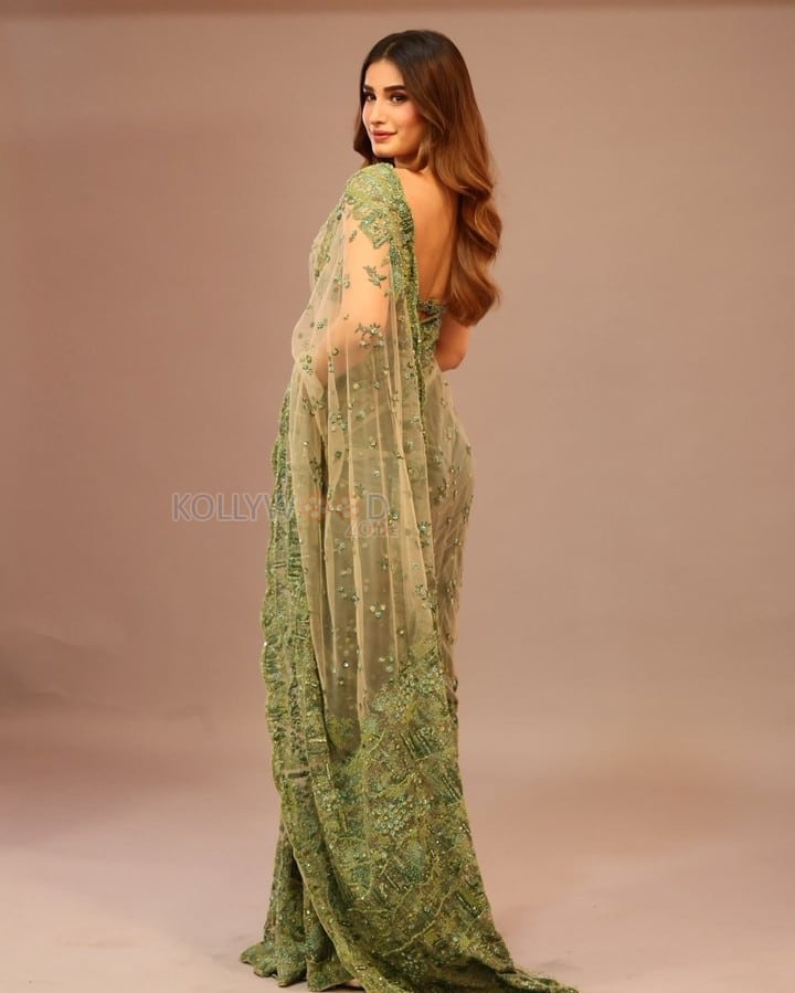 Gorgeous Rasha Thadani in a Transparent Green Saree with a Matching Sleeveless Blouse Photos 06