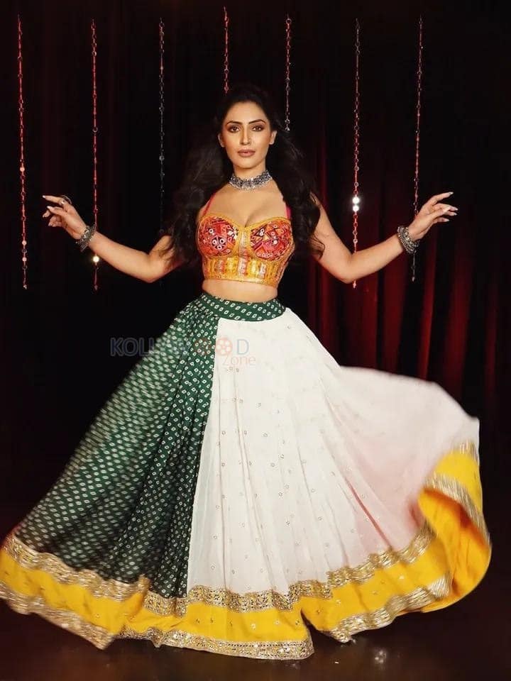 Hot Shivangi Verma in a Multi Coloured Designer Lehenga Gown with a Sleeveless Deep Neck Top Photos 03