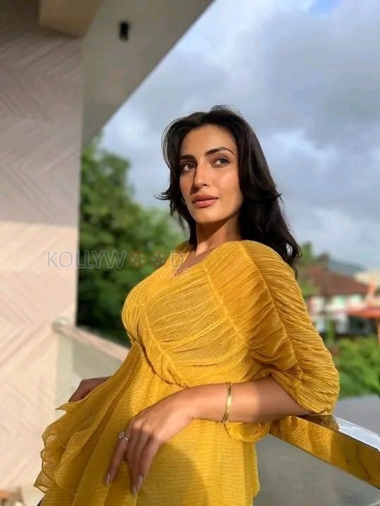 Indian Television Actress Shivangi Verma in a Yellow See Through Top with a Black Bra Photos 02