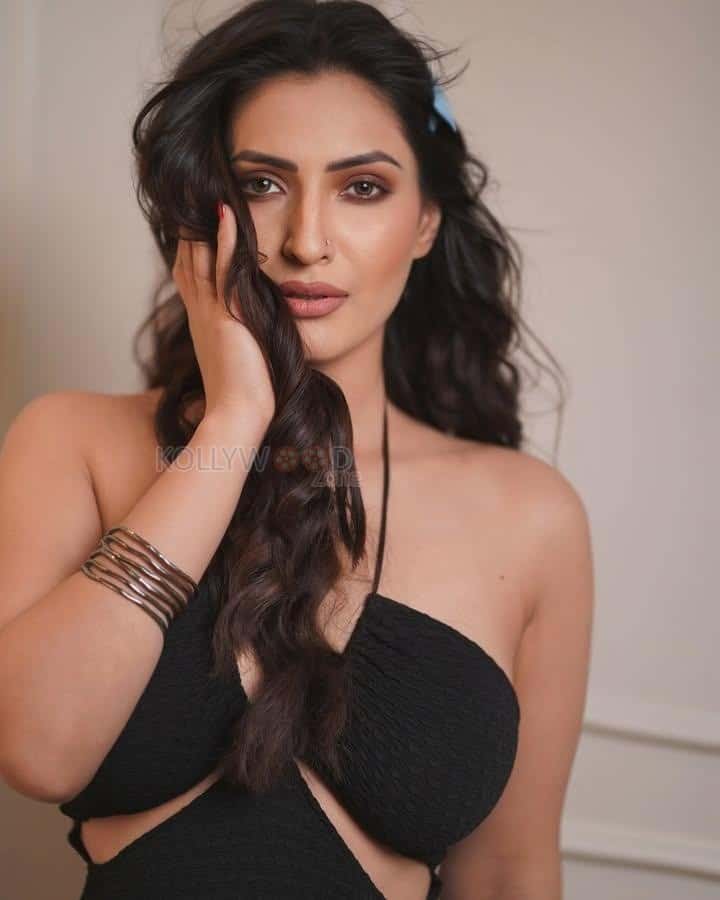 Pretty Shivangi Verma in a Black Halter Neck Cut Out Crop Top with a Mini Blue Skirt Photos 02