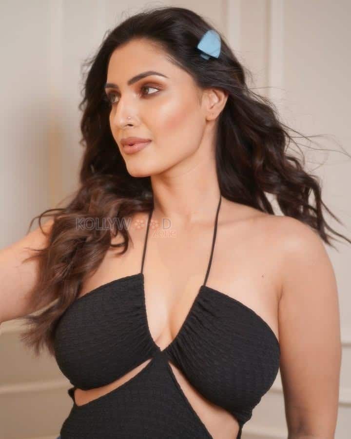 Pretty Shivangi Verma in a Black Halter Neck Cut Out Crop Top with a Mini Blue Skirt Photos 03