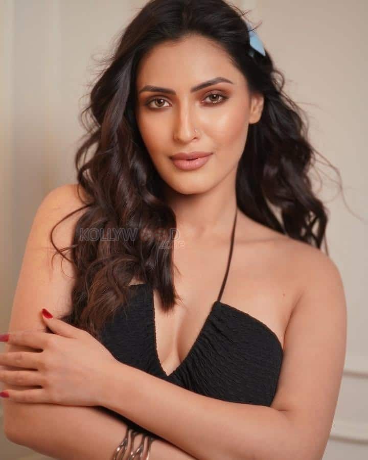 Pretty Shivangi Verma in a Black Halter Neck Cut Out Crop Top with a Mini Blue Skirt Photos 04