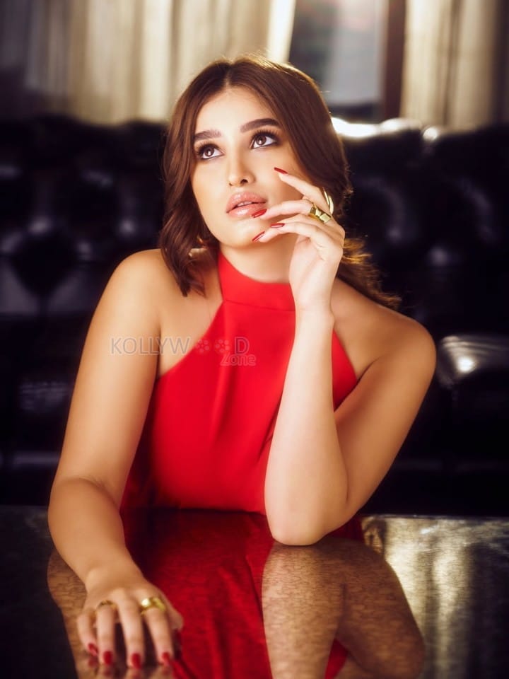 Ravishing Rasha Thadani in a Red Cutout Halter Neck Jumpsuit Photos 01