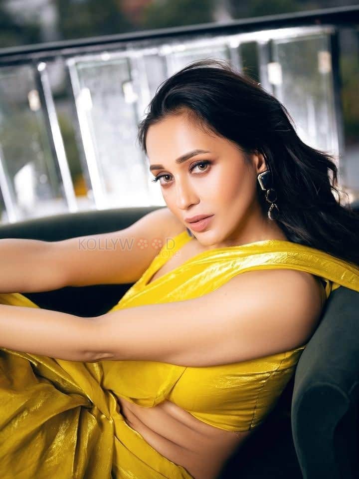 Hot Bengali Actress Mimi Chakraborty in a Bright Yellow Saree with Sleeveless Blouse Pictures 04
