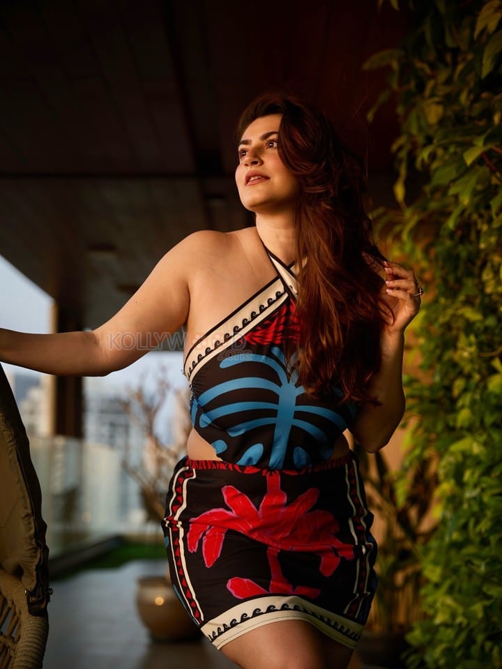 Bold Shivaleeka Oberoi in a Black and Blue Halter Neck Top with a Vibrant Floral Skirt Photos 03