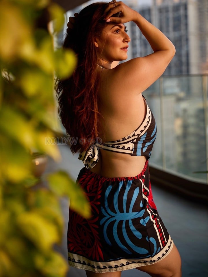 Bold Shivaleeka Oberoi in a Black and Blue Halter Neck Top with a Vibrant Floral Skirt Photos 04