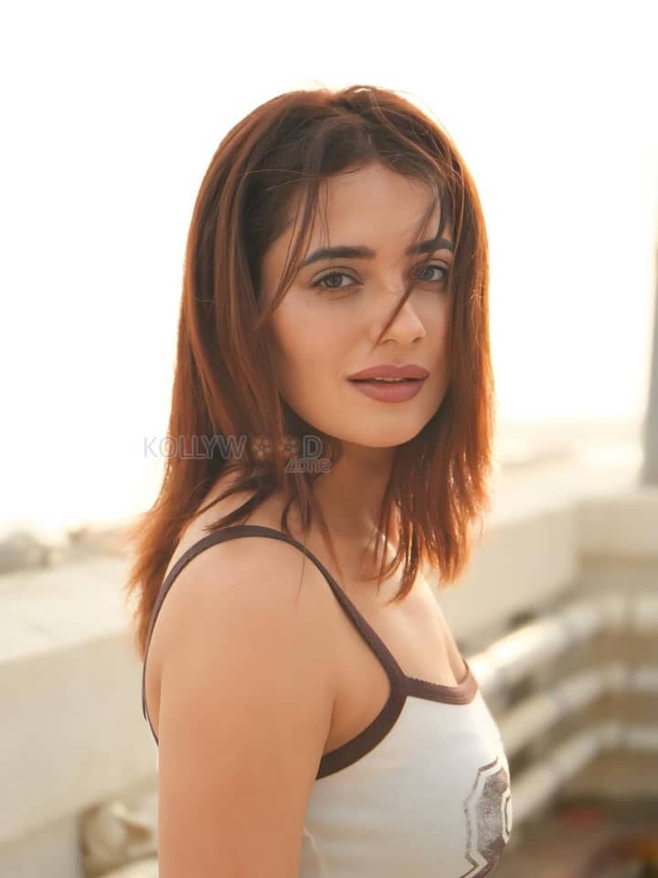 Petite Beauty Priyanka Rewri in a White Printed Tank Top and Black Mini Skirt Pictures 03