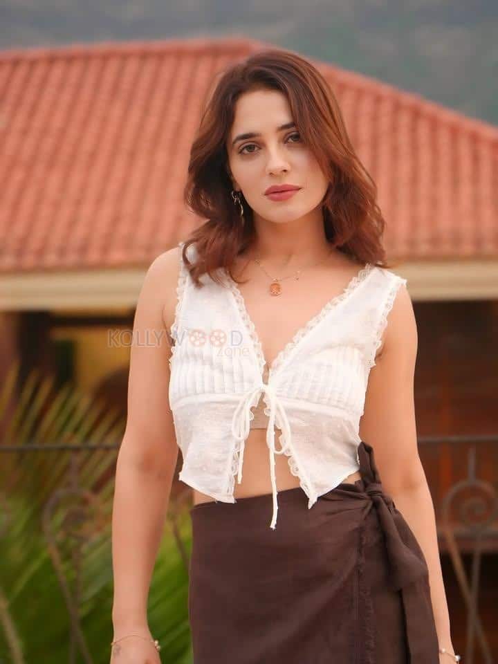 Sexy Hot Priyanka Rewri in a White Sleeveless Crop Top and Brown Tie Up Skirt Photos 03