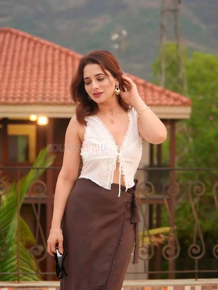 Sexy Hot Priyanka Rewri in a White Sleeveless Crop Top and Brown Tie Up Skirt Photos 04