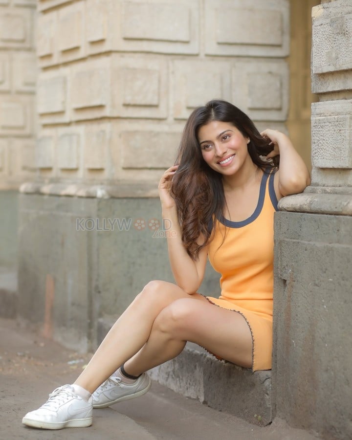 Sexy Aparna Dixit in an Orange Mini Dress Pictures 03