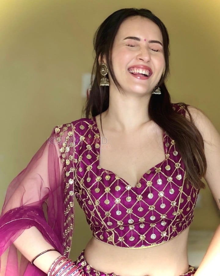 Actress Varsha Rekhate in Pink Lehenga Choli Photos 01