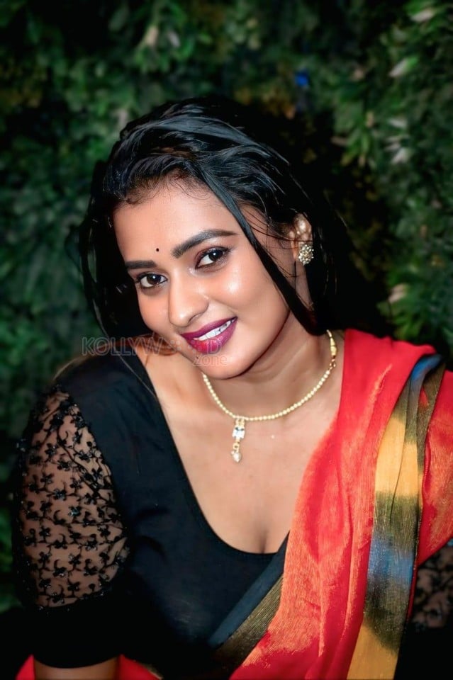 Actress Chaitra Ram in a Red Saree with a Black Blouse Photos 02