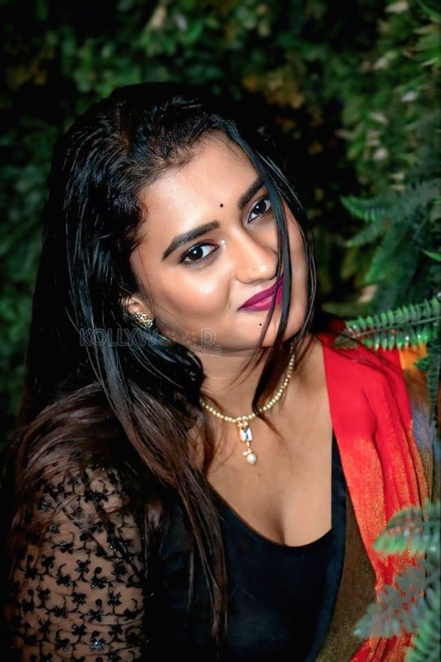 Actress Chaitra Ram in a Red Saree with a Black Blouse Photos 03