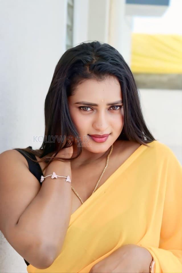 Kannada Beauty Chaitra Ram in a Yellow Saree and Black Sleeveless Blouse Pictures 01