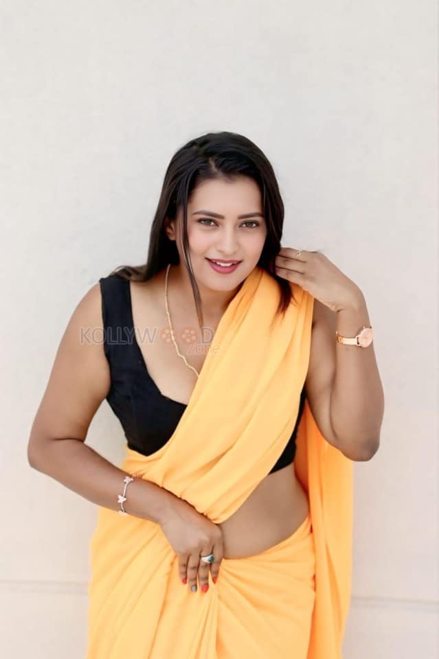 Kannada Beauty Chaitra Ram in a Yellow Saree and Black Sleeveless Blouse Pictures 02
