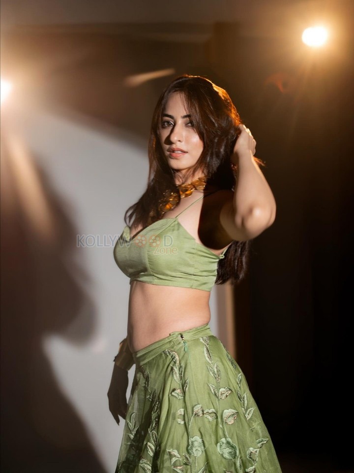 Rose Garden Actress Niyati Fatnani in a Sexy Green Lehenga Photos 03