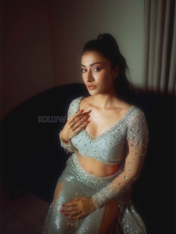 Sexy Dhanashree Verma in an Icy Light Blue Two Piece Sequin Outfit with a Long Sleeved Deep V Neck Crop Top with a Matching Thigh High Slit Pictures 01