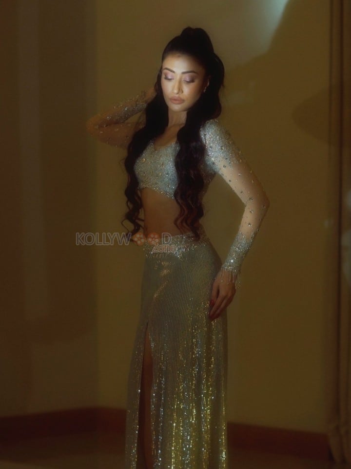 Sexy Dhanashree Verma in an Icy Light Blue Two Piece Sequin Outfit with a Long Sleeved Deep V Neck Crop Top with a Matching Thigh High Slit Pictures 02