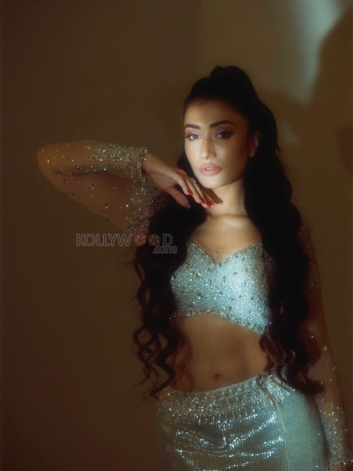 Sexy Dhanashree Verma in an Icy Light Blue Two Piece Sequin Outfit with a Long Sleeved Deep V Neck Crop Top with a Matching Thigh High Slit Pictures 04