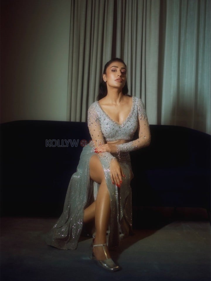 Sexy Dhanashree Verma in an Icy Light Blue Two Piece Sequin Outfit with a Long Sleeved Deep V Neck Crop Top with a Matching Thigh High Slit Pictures 07