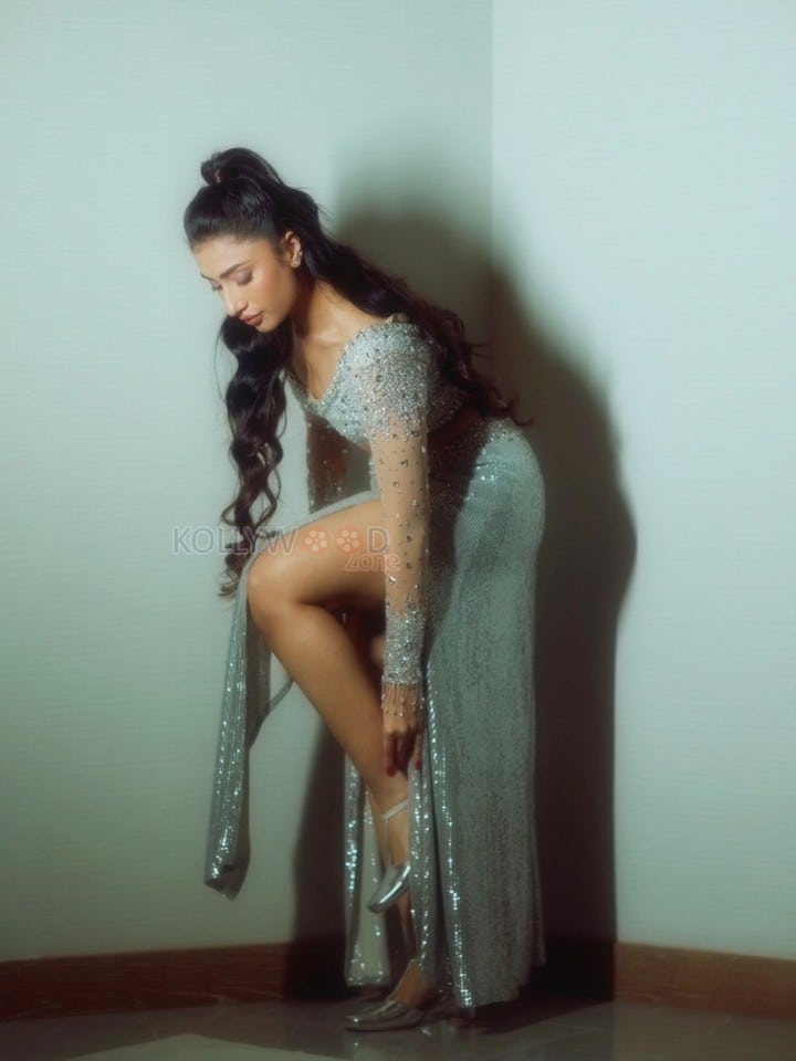 Sexy Dhanashree Verma in an Icy Light Blue Two Piece Sequin Outfit with a Long Sleeved Deep V Neck Crop Top with a Matching Thigh High Slit Pictures 09