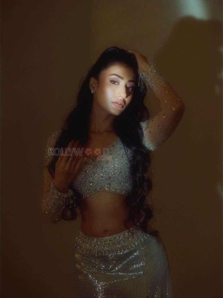 Sexy Dhanashree Verma in an Icy Light Blue Two Piece Sequin Outfit with a Long Sleeved Deep V Neck Crop Top with a Matching Thigh High Slit Pictures 10