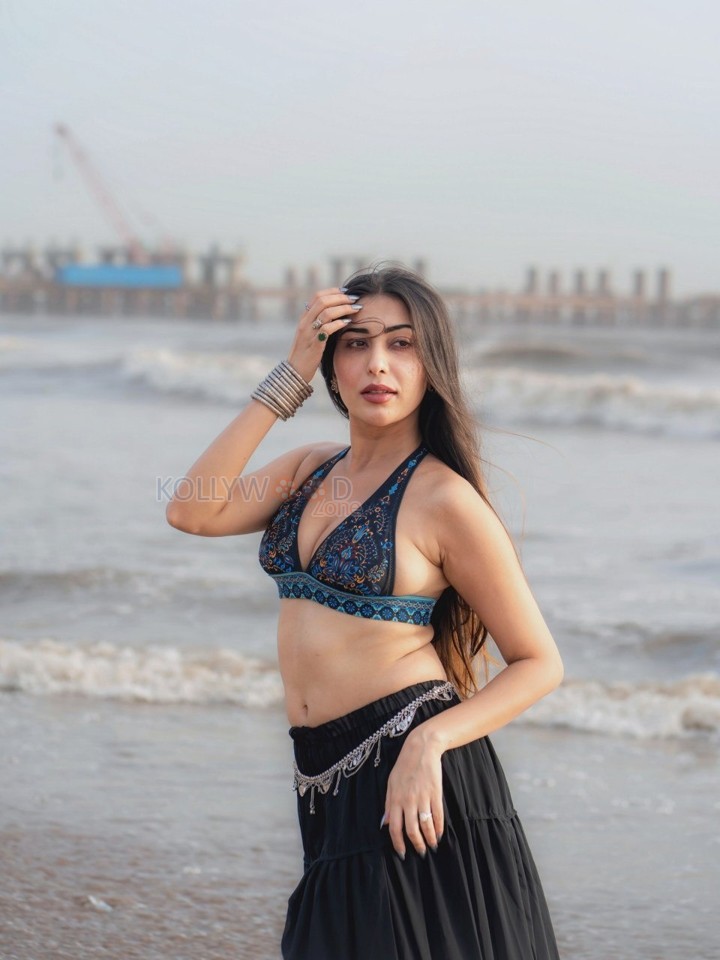 Sexy Ruma Sharma in a Bohemian Style Halter Neck Top with a Black Tiered Skirt Photos 03