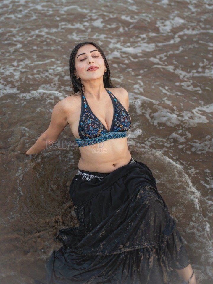 Sexy Ruma Sharma in a Bohemian Style Halter Neck Top with a Black Tiered Skirt Photos 04