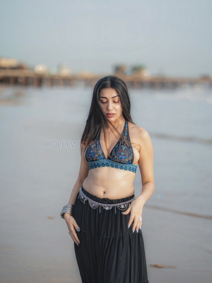 Sexy Ruma Sharma in a Bohemian Style Halter Neck Top with a Black Tiered Skirt Photos 05