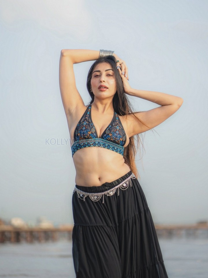 Sexy Ruma Sharma in a Bohemian Style Halter Neck Top with a Black Tiered Skirt Photos 06