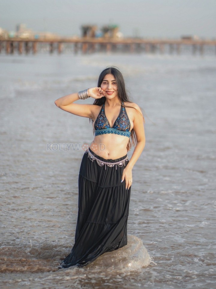 Sexy Ruma Sharma in a Bohemian Style Halter Neck Top with a Black Tiered Skirt Photos 08