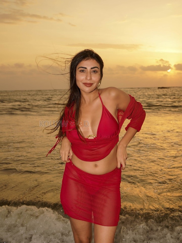 Temptation Island Beauty Ruma Sharma in a Red Sheer Long Sleeved Crop Top and Mini Skirt over a Bikini Photos 07