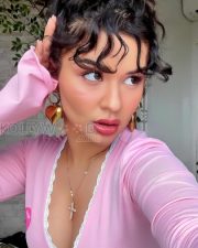 Alluring Avneet Kaur Cleavage in a Pink Lace Trim Tie Front Crop Top Photos 01