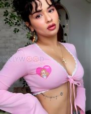 Alluring Avneet Kaur Cleavage in a Pink Lace Trim Tie Front Crop Top Photos 02