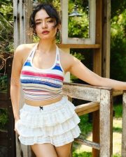 Charming Actress Avneet Kaur in a Striped Halter Crop Top White Ruffle Mini Skirt Photos 02