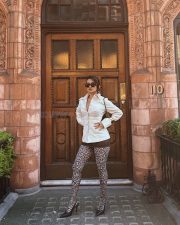 Chic Beauty Avneet Kaur in a White Shirt with Brown Mini Skirt and Printed Long Socks Photos 01 Chic Beauty Avneet Kaur in a White Shirt with Brown Mini Skirt and Printed Long Socks Photos 01