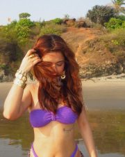 Gorgeous Avneet Kaur in a Strapless Purple Bandeau Bikini with a Leopard Print Sarong Pictures 02