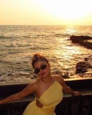 Gorgeous Avneet Kaur in a Yellow Backless Maxi Dress Photos 02