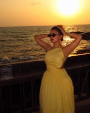 Gorgeous Avneet Kaur in a Yellow Backless Maxi Dress Photos 03