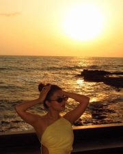 Gorgeous Avneet Kaur in a Yellow Backless Maxi Dress Photos 05