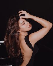 Love in Vietnam Actress Avneet Kaur in a black open back halter top photos 01