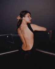 Love in Vietnam Actress Avneet Kaur in a black open back halter top photos 04