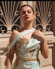 Riveting Avneet Kaur in a Thigh Slit Dress at Cannes Photos 06